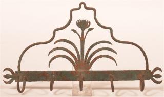 Appraisal: th Century Wrought Iron wall Rack Floral and foliate back