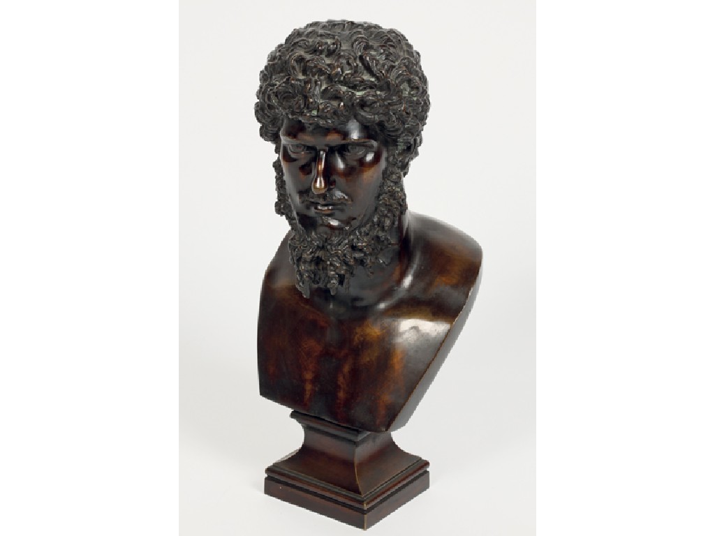 Appraisal: A BRONZE BUST of a Roman style emperor with curly