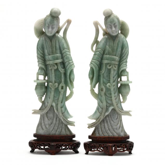 Appraisal: A PAIR OF CHINESE JADE FEMALE FIGURES Early th century