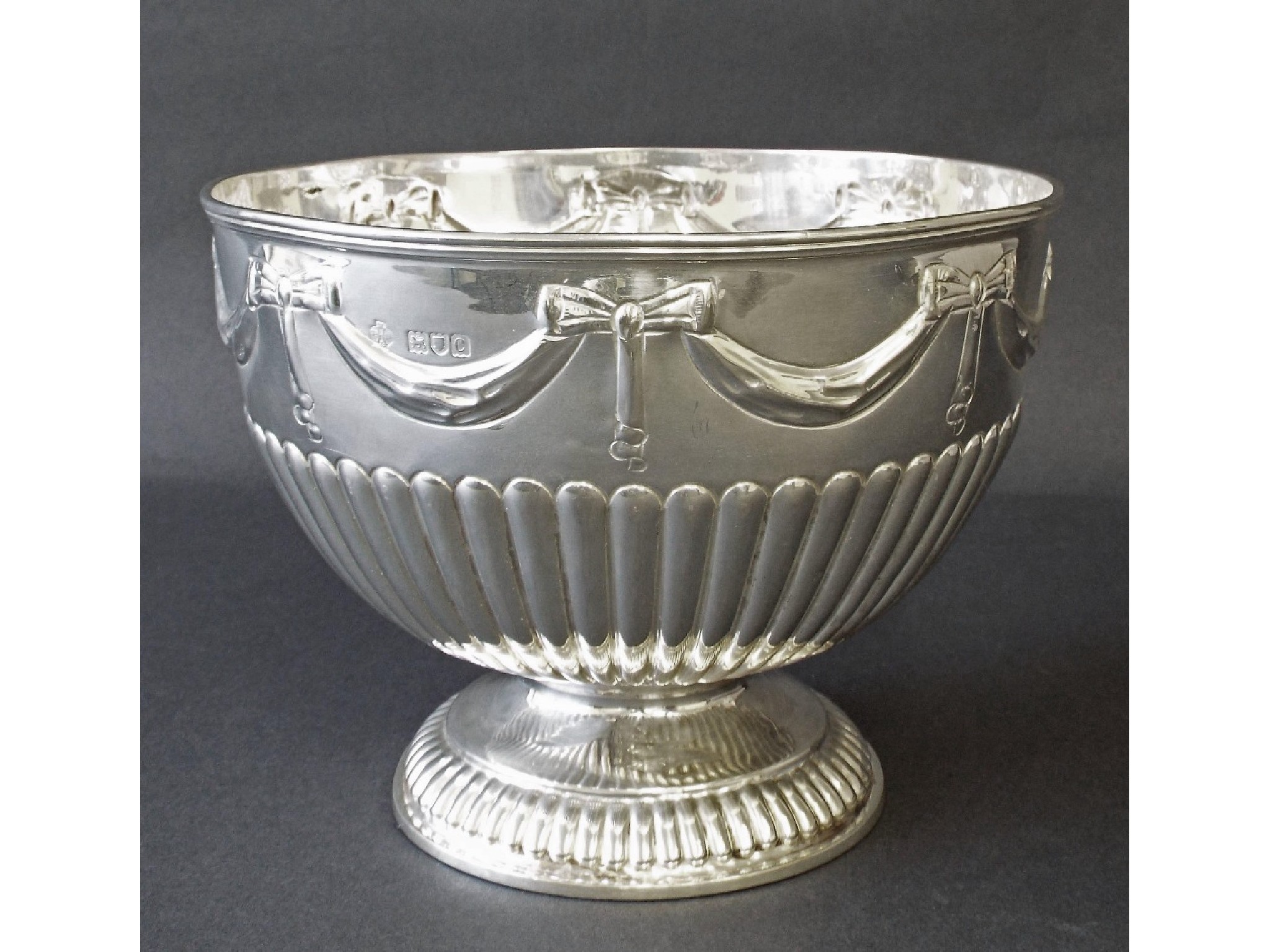 Appraisal: Victorian silver half fluted rose bowl embossed with garland swags