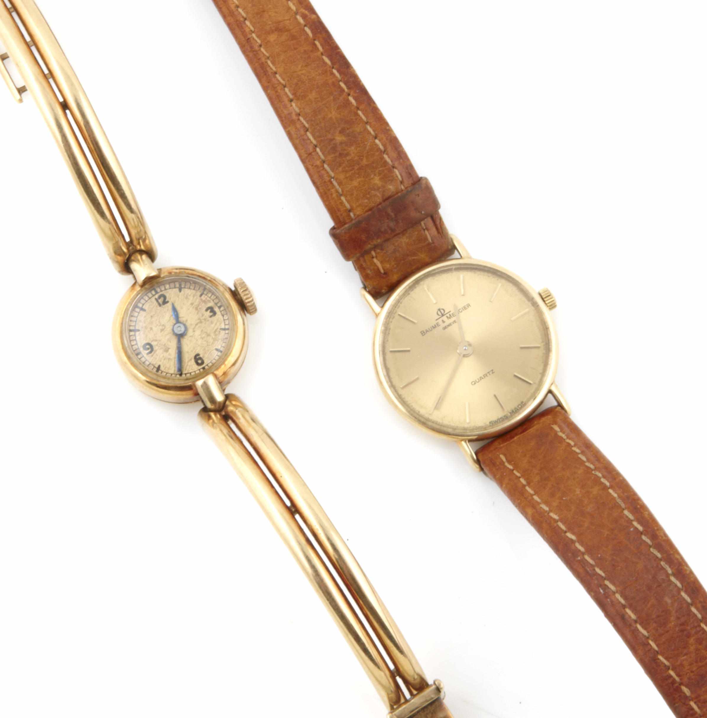 Appraisal: A collection of two K gold wristwatches one signed Baume