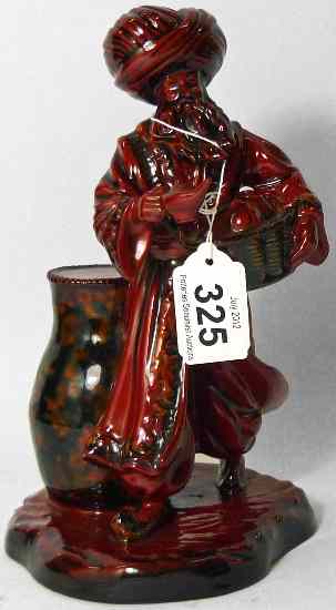 Appraisal: Royal Doulton Flambe Figure The Lamp Seller HN