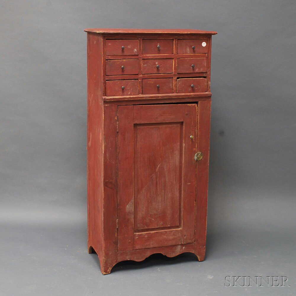 Appraisal: Red-painted Apothecary Cupboard th century the top section with nine