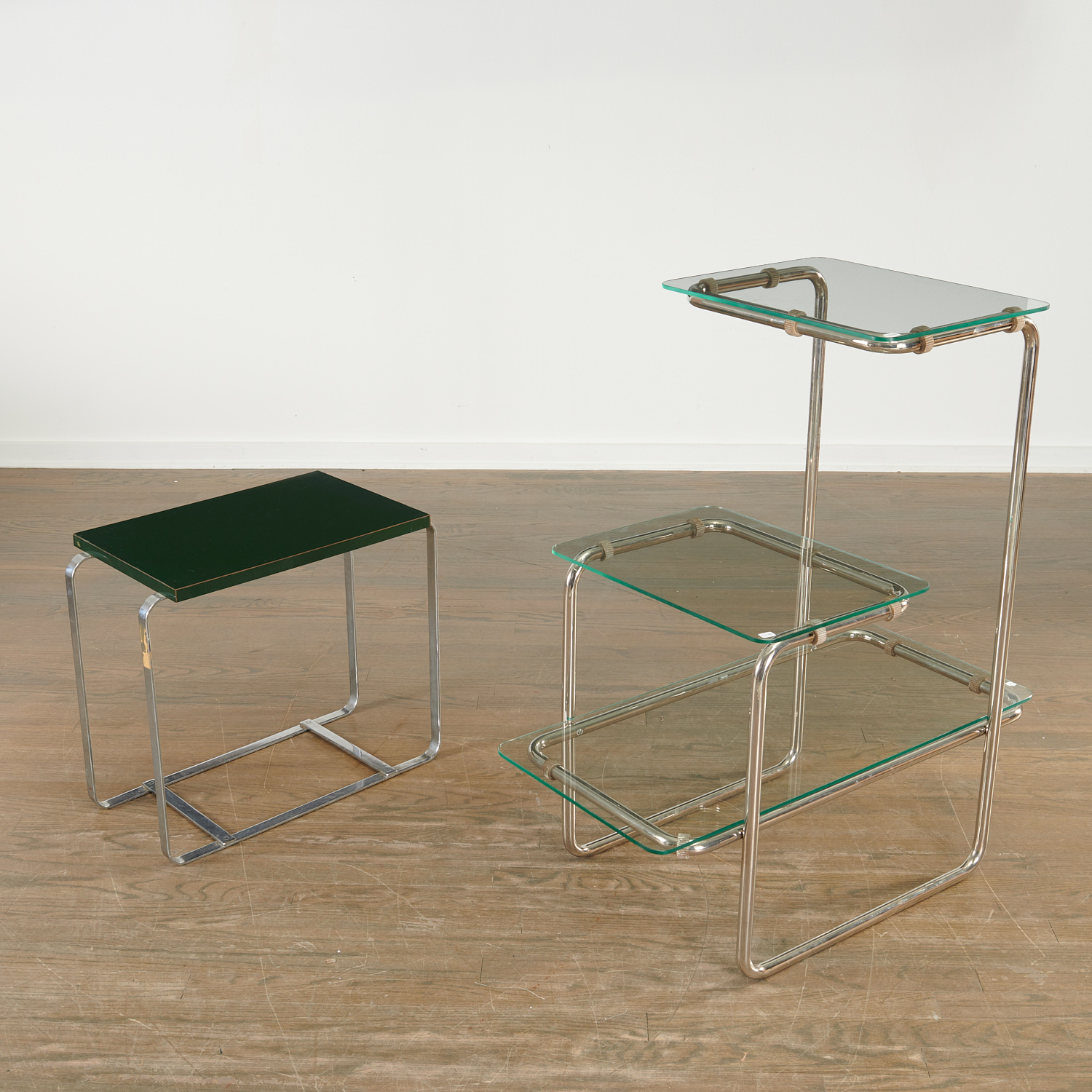 Appraisal: BAUHAUS OR ART DECO CHROME OCCASIONAL TABLES c s incl