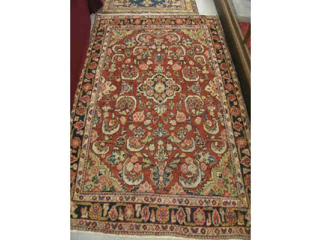 Appraisal: Mahal Persian Handmade Rug floral on red field ' x