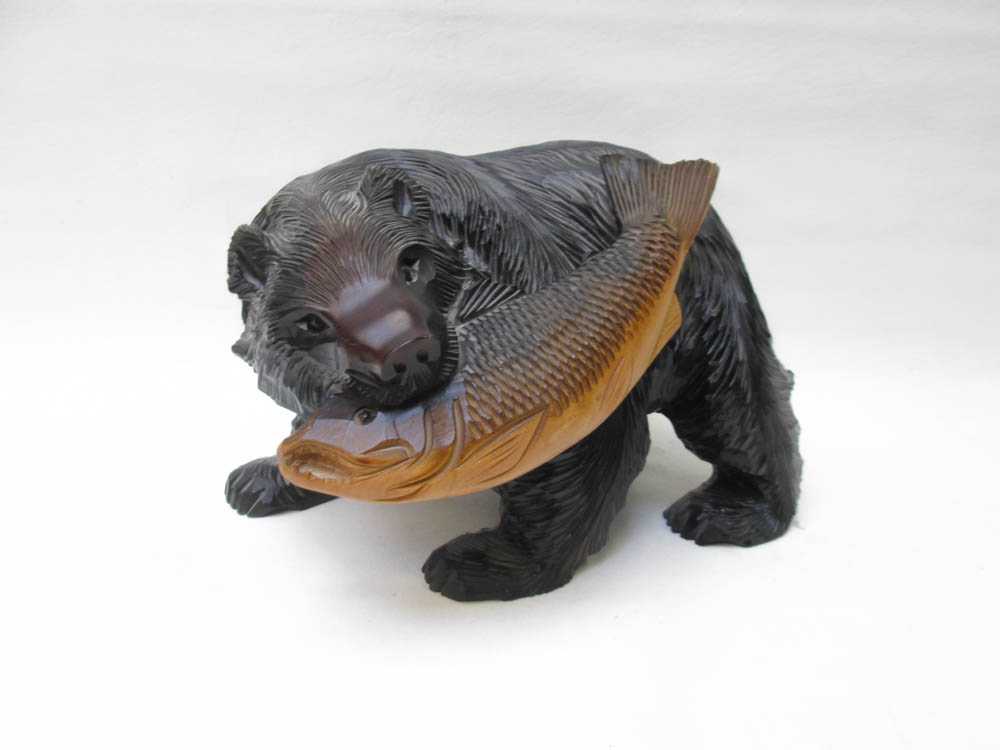 Appraisal: JAPANESE CARVED WOOD WILDLIFE SCULPTURE Higuma carved wood Ainu Bear