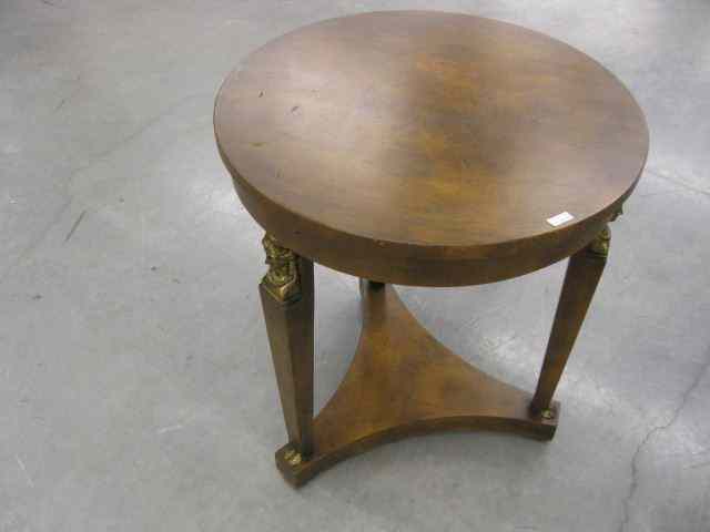 Appraisal: Baker Neo-Classical style Table round top tri-footed with busts of