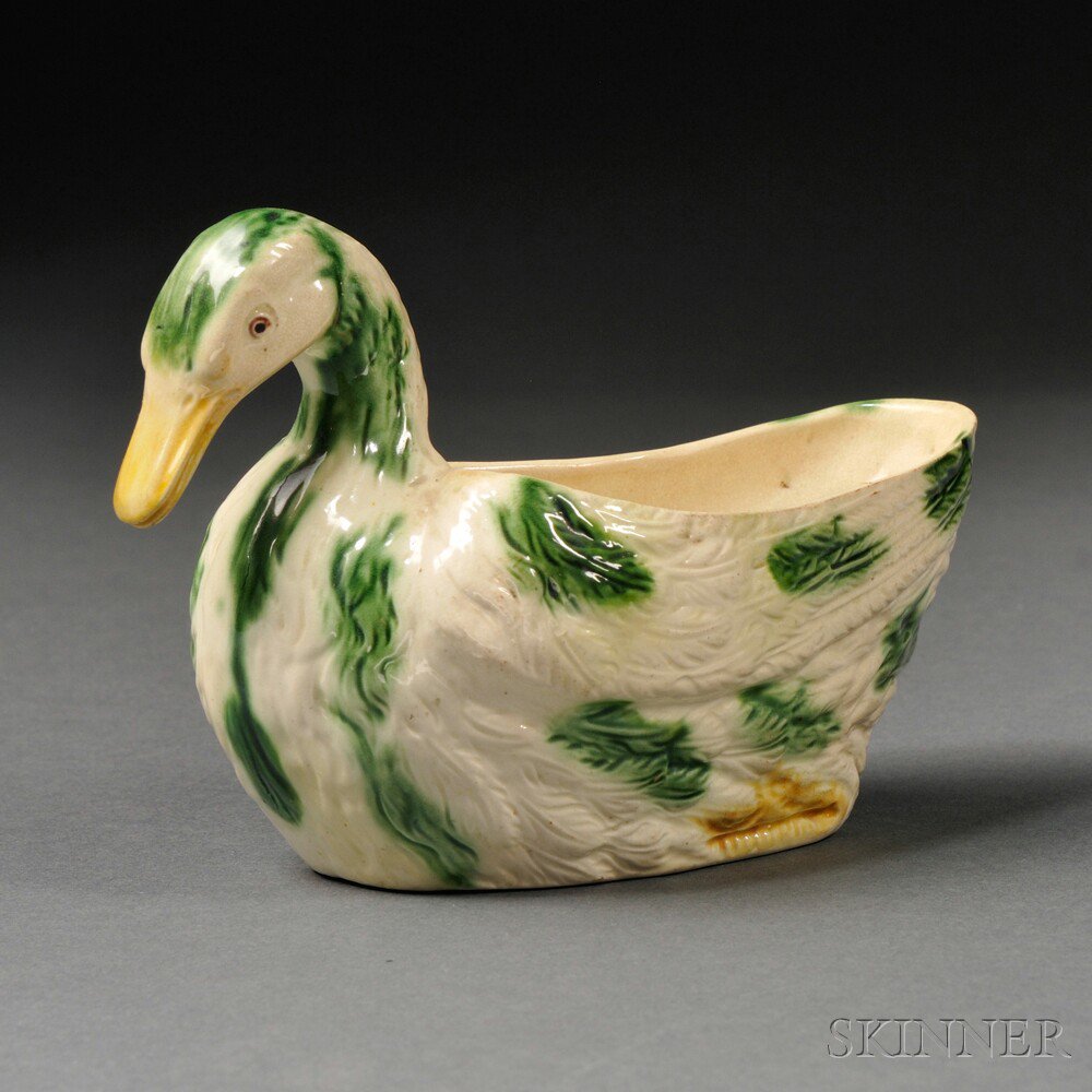 Appraisal: Staffordshire Cream-colored Earthenware Duck-form Sauceboat England c with splashes of