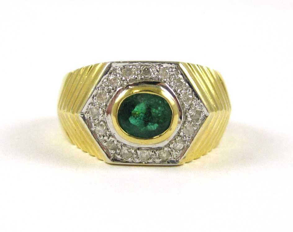 Appraisal: EMERALD DIAMOND AND FOURTEEN KARAT GOLD RING with round-cut diamonds