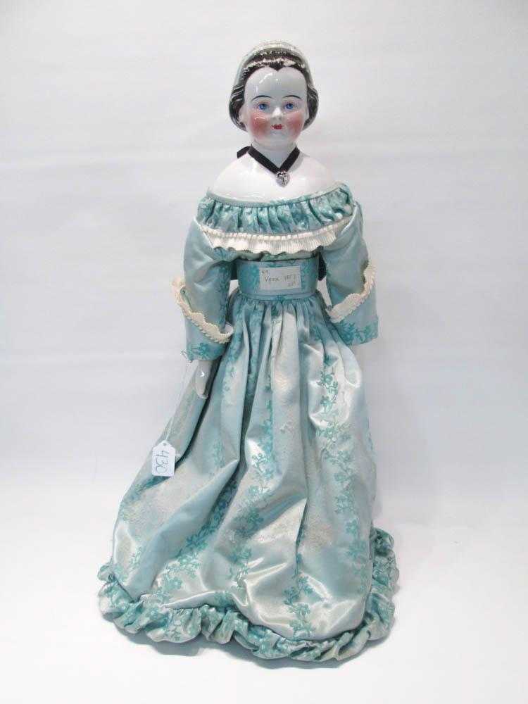 Appraisal: GERMAN CHINA SHOULDER HEAD LADY DOLL Vera having molded black