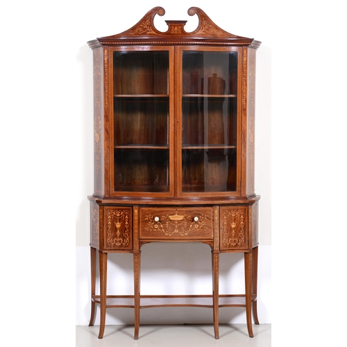 Appraisal: An Edwardian serpentine mahogany inlaid and penwork china cabinet with