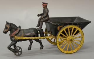 Appraisal: Cast iron horse drawn coal cart pull toy with one