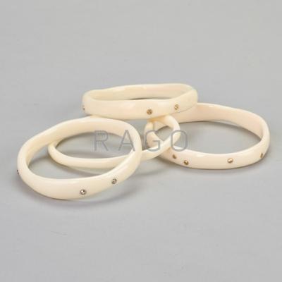 Appraisal: IPPOLITA WHITE RESIN AND DIAMOND BANGLES Stack of four two