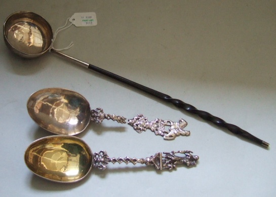 Appraisal: A toddy ladle the circular bowl crest engraved and with