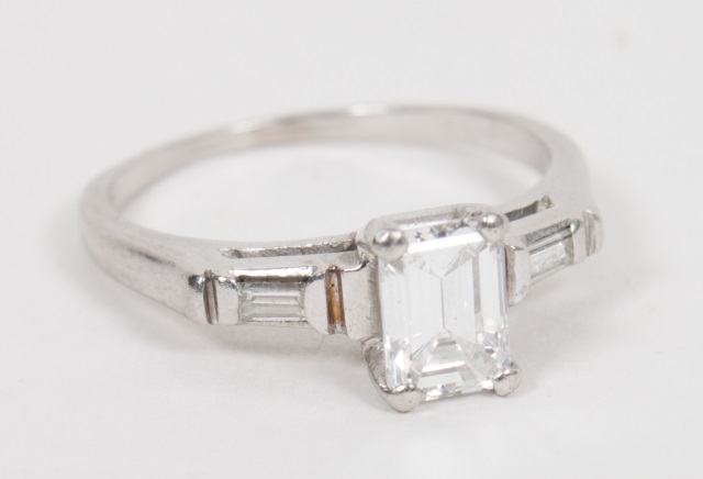 Appraisal: Lady's platinum and diamond engagement ring presenting an emerald-cut stone