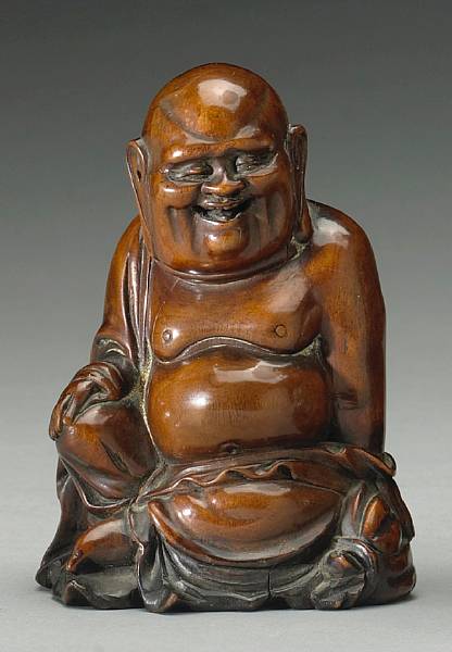 Appraisal: Qing Dynasty The jolly mythical monk shown seated in 'royal