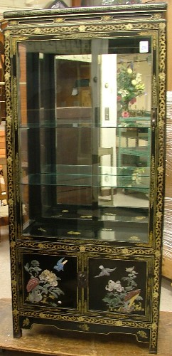 Appraisal: CHINESE CURIO DISPLAY CABINET ON CABINET with overall black lacquer