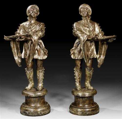 Appraisal: PAIR OF SILVERED SCULPTURES OF MOORS known as porta carte