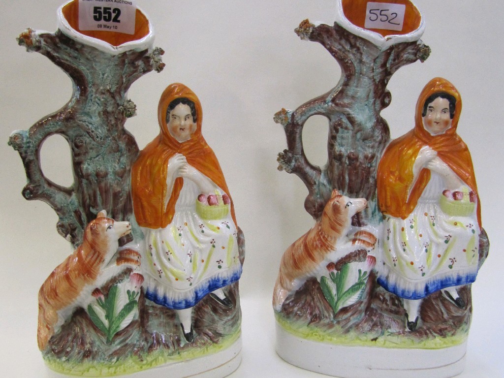 Appraisal: Pair of Staffordshire 'Little Red Riding Hood' spill vases