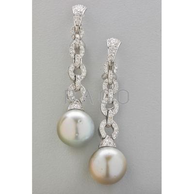 Appraisal: GREY SOUTH SEA PEARL AND DIAMOND K GOLD EARRINGS Each