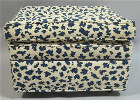 Appraisal: BLUE AND WHITE UPHOLSTERED OTTOMAN th century the button tufted