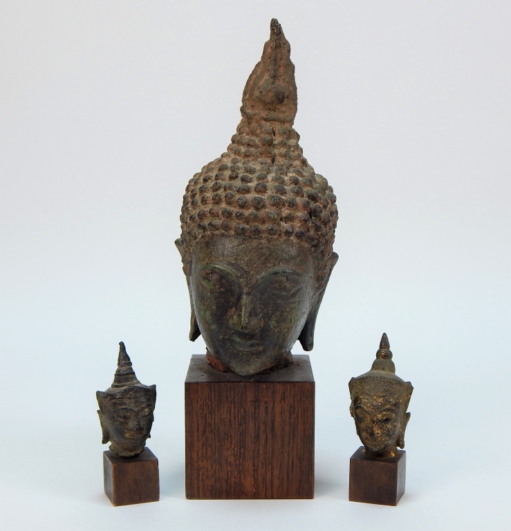 Appraisal: THAI BRONZE BUDDHA ARCHITECTURAL FRAGMENT GROUP Thailand th- th CenturyIncludes