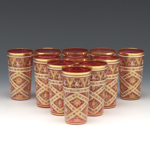 Appraisal: ELEVEN MOSER CRANBERRY GLASS ENAMELED TUMBLERS Conical hand blown cranberry