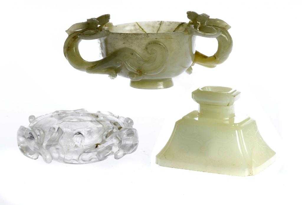 Appraisal: A CHINESE CELADON JADE CUP the urnular bowl with slightly