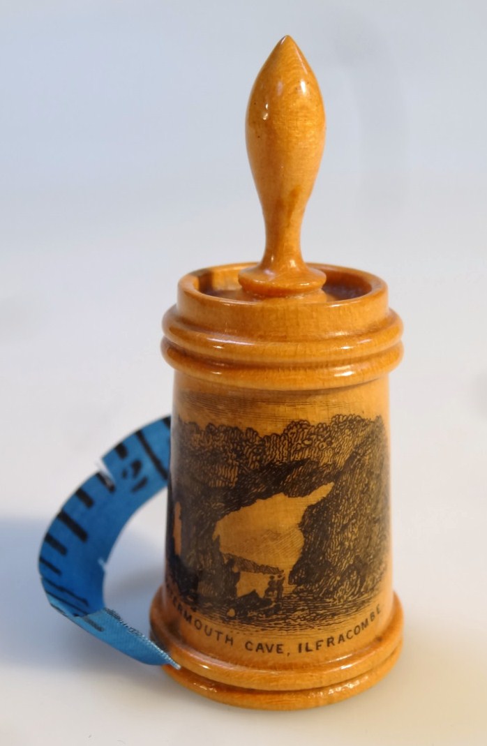 Appraisal: An early thC Mauchline Ware sycamore tape measure with tapering