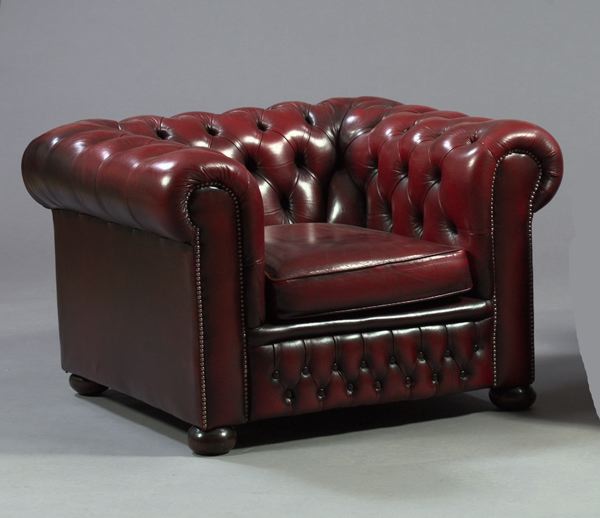 Appraisal: Victorian-Style Tufted Leather Upholstered Library Armchair of box form with