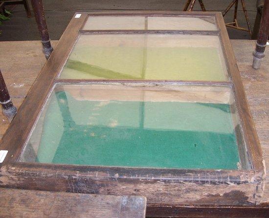 Appraisal: An oak framed table top display cabinet fitted three drawers