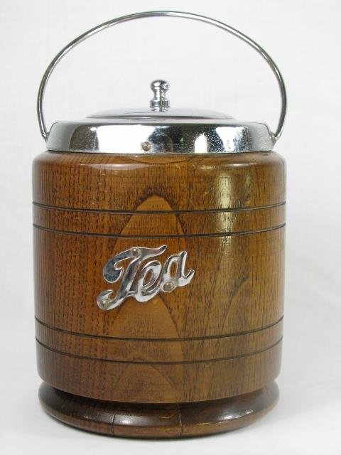 Appraisal: Polished oak caddy with chrome metal fittings and porcelain liner