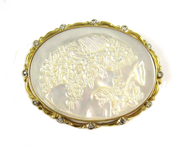 Appraisal: MOTHER-OF-PEARL AND DIAMOND SLIDER PENDANT BROOCH k yellow and white