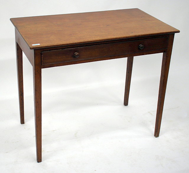 Appraisal: A VICTORIAN MAHOGANY RECTANGULAR SIDE TABLE with one long drawer