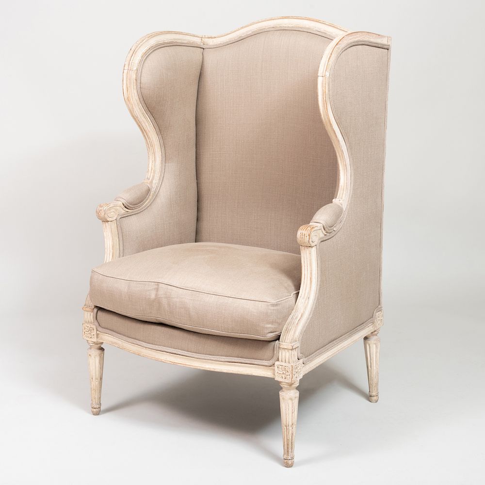 Appraisal: Louis XVI Style Cream Painted Bergere Upholstered in beige linen