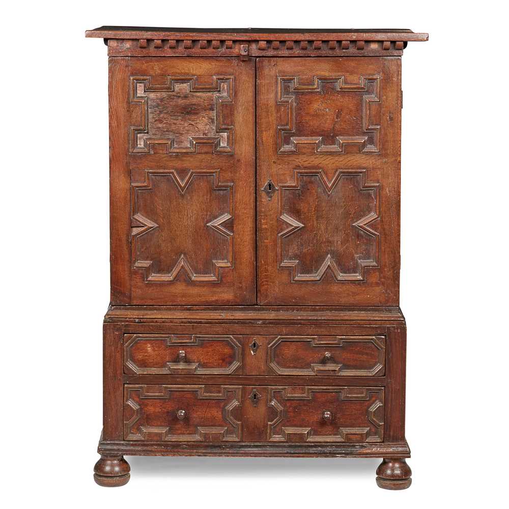 Appraisal: OAK PANEL CHEST-ON-CHEST TH CENTURY the projecting top above a