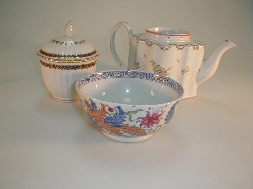 Appraisal: A Newhall commode shape teapot painted with flowers in red