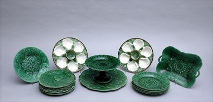 Appraisal: SEVEN-PIECE WEDGWOOD GREEN-GLAZED POTTERY PART DESSERT SERVICE AND OTHER PLATES