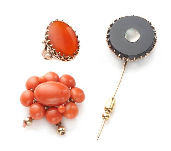 Appraisal: A fire opal and k gold ring a coral clasp