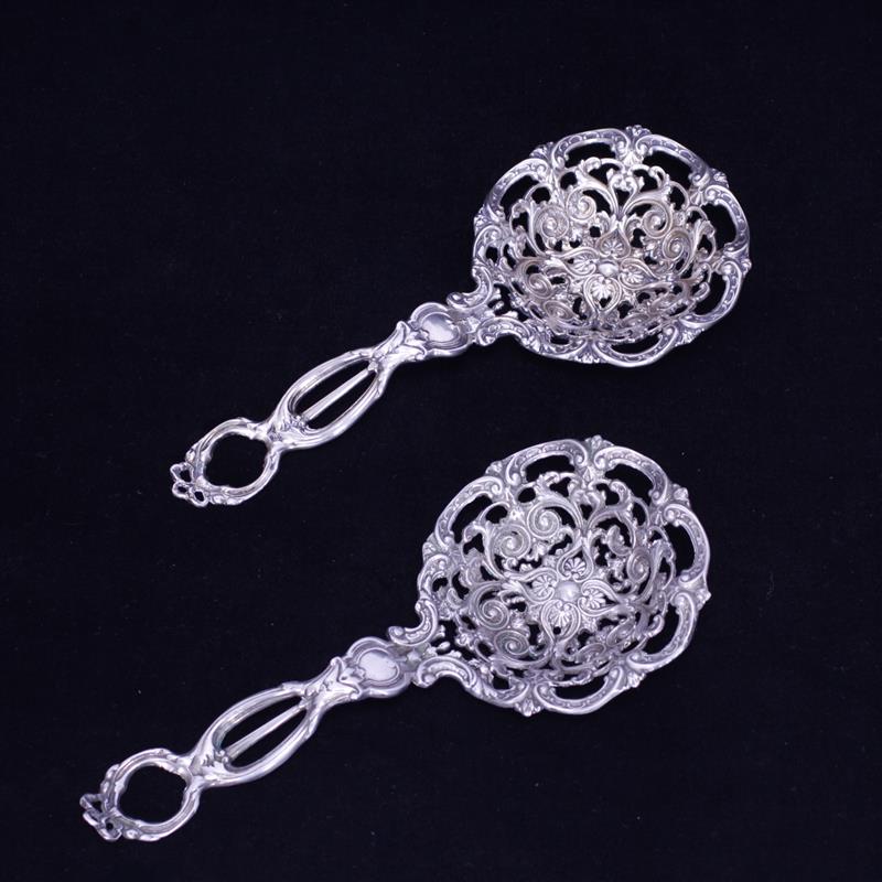 Appraisal: Pair Silvercraft openwork sterling silver bon bon spoon servers Troy