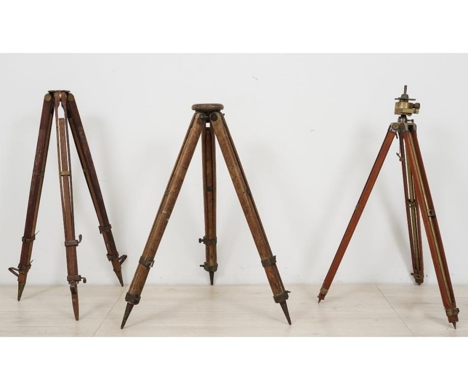 Appraisal: Two Gurley wood brass expanding transit tripods marked on legs