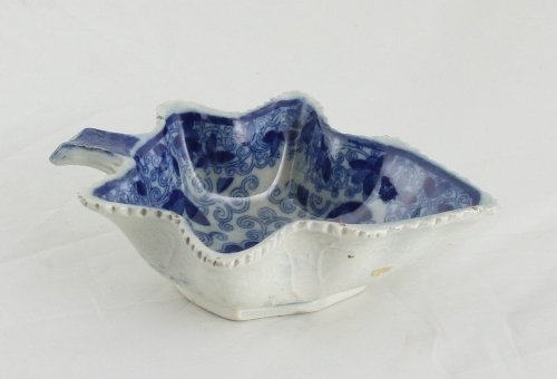 Appraisal: A Staffordshire blue and white leaf shaped pickle dish decorated