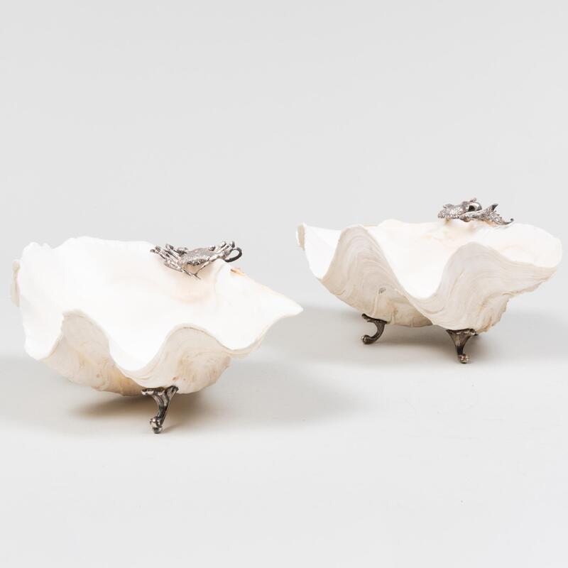 Appraisal: Pair of Shells Mounted with Silver Metal Crustaceans The larger