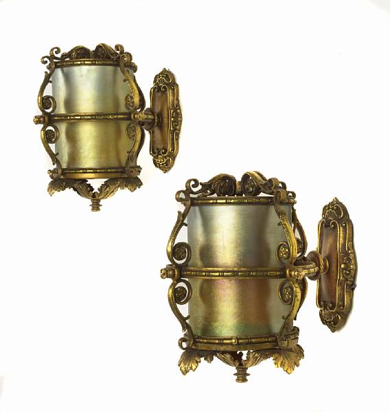 Appraisal: A pair of American cast gilt-metal and iridescent glass single