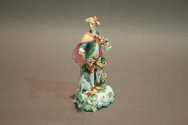 Appraisal: A th century figure of a gallant with a fruit