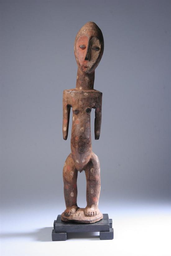 Appraisal: HEMBA TRIBE POLYCHROME WOOD FIGURE OF WOMAN Republic of Congo