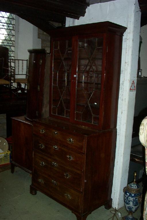 Appraisal: An early th century mahogany chest of long graduated drawers