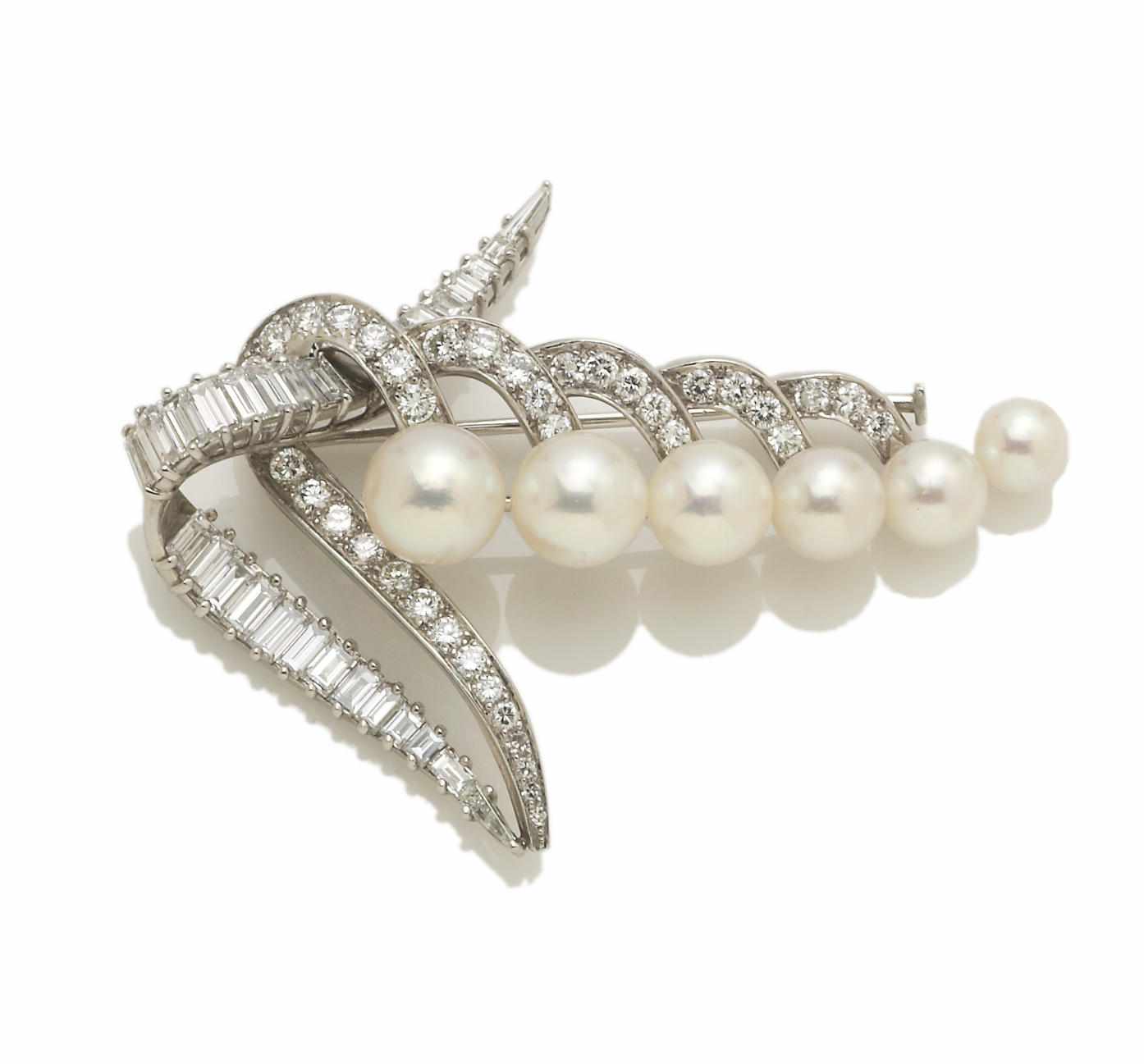 Appraisal: A diamond and cultured pearl brooch cultured pearls measuring approximately