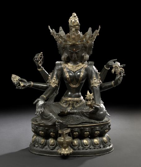 Appraisal: Large Nepalese Cast-Bronze Figure of Tara the three-headed six-armed goddess