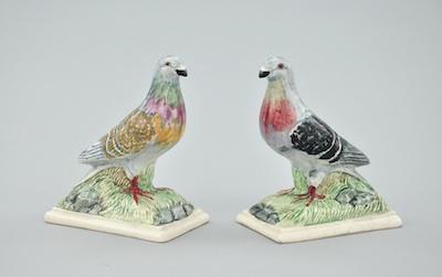 Appraisal: A Pair of Porcelain Birds The pair of molded porcelain